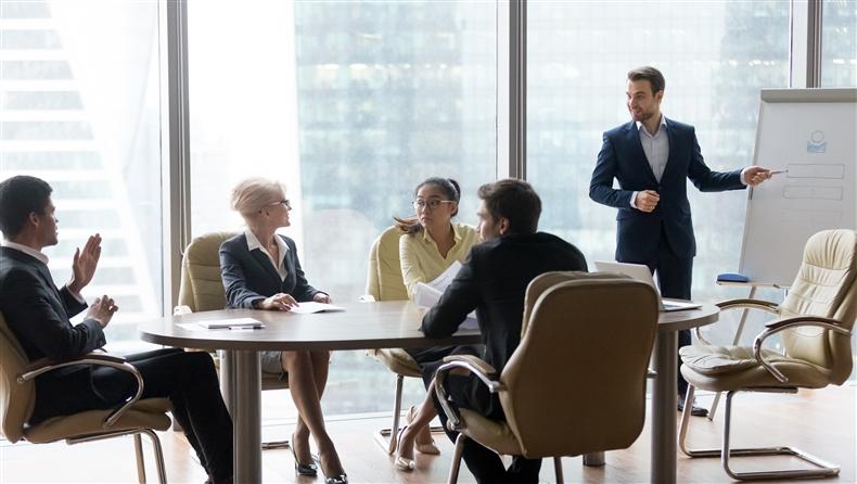 Man in blue suit having a meeting